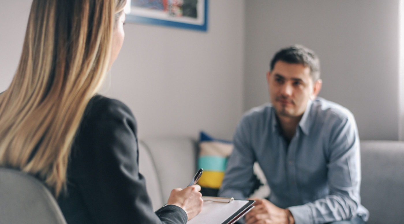 therapist with male patient